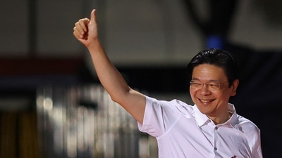 Singapore's Prime Minister Lawrence Wong arrives at an assembly area for People's Action Party supporters, on the day of the general election in Singapore, May 3, 2025. (REUTERS)