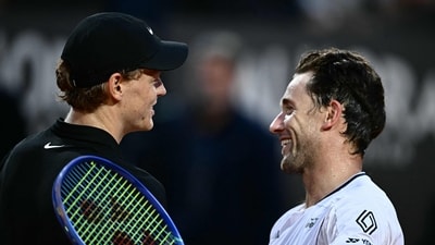 Italy's Jannik Sinner (l) celebrates at the end of his men's singles quarter-final match against Norway's Casper Ruud (r) (AFP) Italy's Jannik Sinner (l) celebrates at the end of his men's singles quarter-final match against Norway's Casper Ruud (r) (AFP)