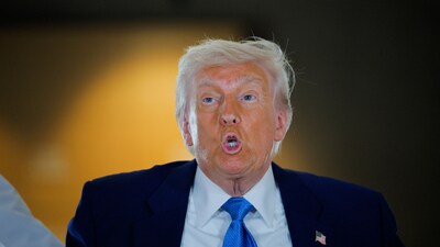 Trump said again that he was not shocked Putin missed the talks. (REUTERS)