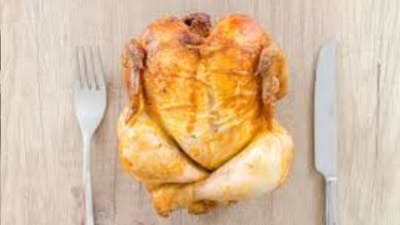 The TSA stopped her for carrying a whole rotisserie chicken. (Representational Image/Pexel) The TSA stopped her for carrying a whole rotisserie chicken. (Representational Image/Pexel)