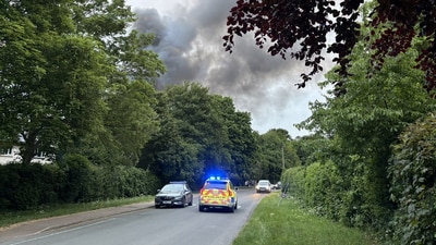 Smoke was seen and explosions heard at the scene of the blaze at Bicester (PA ) Smoke was seen and explosions heard at the scene of the blaze at Bicester (PA )