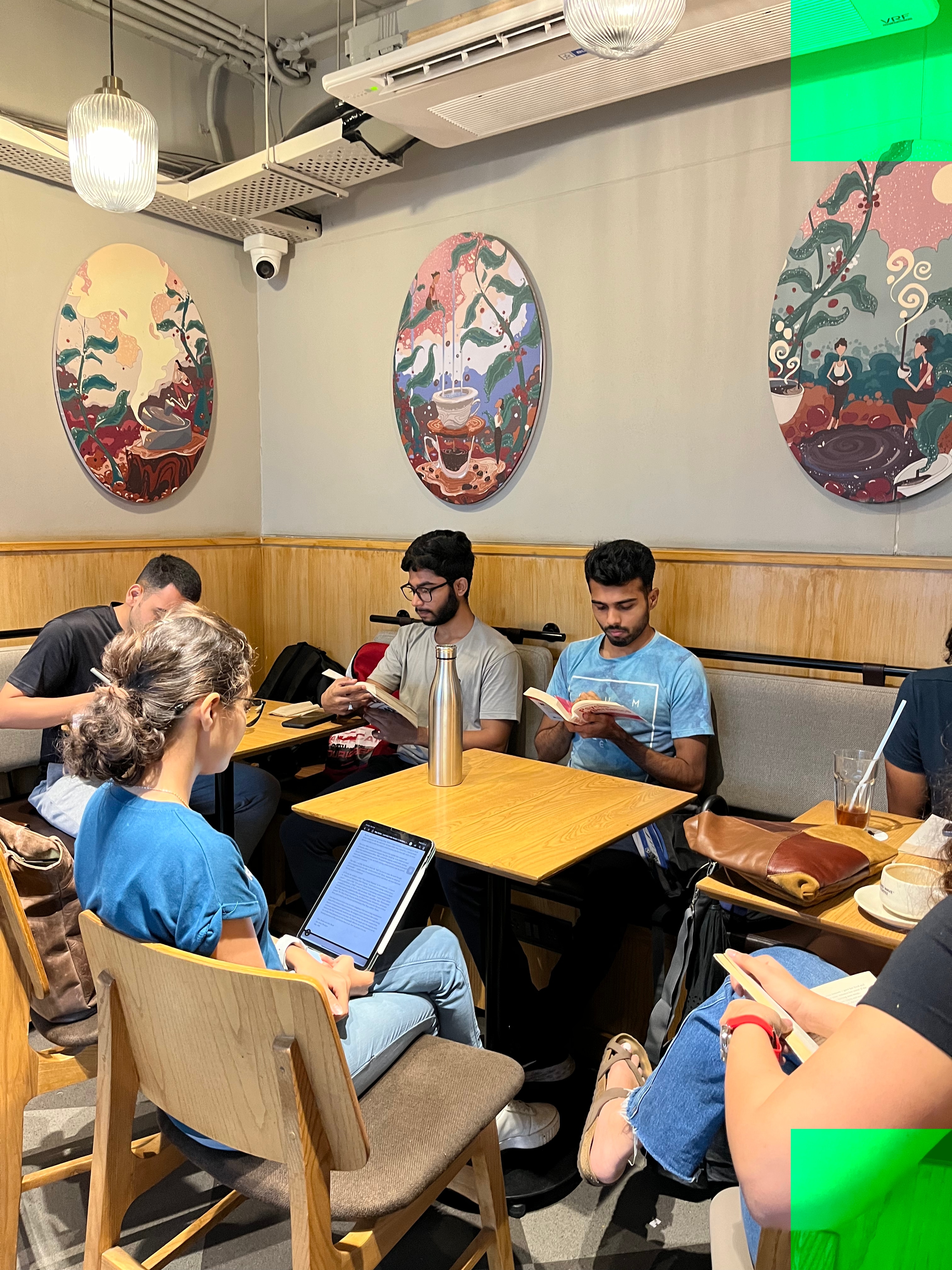 The reading group taking it indoors during inclement weather (Charvi Garg) The reading group taking it indoors during inclement weather (Charvi Garg)