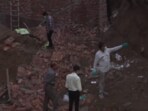 Rescue teams work at the site of an under-construction building that collapsed in Delhi’s Paharganj area. Rescue teams work at the site of an under-construction building that collapsed in Delhi’s Paharganj area.