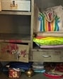 The cash was hidden in a metal cupboard that was concealed behind a wooden door