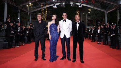 (FROM L) Hong kong actor Tony Leung Ka-Fai, Chinese actress Yuanyuan Gao, Chinese actor Louis Koo and Hong kong director, screenwriter and producer Juno Mak arrive for the screening of the film "Fung Lam Fo Saan" (Sons of the Neon Night) at the 78th edition of the Cannes Film Festival in Cannes, southern France, on May 16, 2025. (Photo by Sameer Al-Doumy / AFP) (AFP) (FROM L) Hong kong actor Tony Leung Ka-Fai, Chinese actress Yuanyuan Gao, Chinese actor Louis Koo and Hong kong director, screenwriter and producer Juno Mak arrive for the screening of the film "Fung Lam Fo Saan" (Sons of the Neon Night) at the 78th edition of the Cannes Film Festival in Cannes, southern France, on May 16, 2025. (Photo by Sameer Al-Doumy / AFP) (AFP)