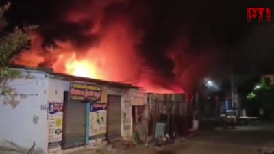 Firefighters are working to control the fire that spread in the scrap factory at Nellore. (PTI/X)