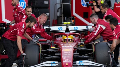Ferrari driver Lewis Hamilton of Britain gets pushed back into his garage during the qualifying session ahead of the Italy's Emilia Romagna Formula One Grand Prix, at the Enzo and Dino Ferrari racetrack in Imola, Italy, Saturday, May 17, 2025. (AP Photo/Luca Bruno, Pool) (AP) Ferrari driver Lewis Hamilton of Britain gets pushed back into his garage during the qualifying session ahead of the Italy's Emilia Romagna Formula One Grand Prix, at the Enzo and Dino Ferrari racetrack in Imola, Italy, Saturday, May 17, 2025. (AP Photo/Luca Bruno, Pool) (AP)