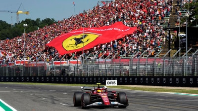 Ferrari's Lewis Hamilton during qualifying as a giant Ferrari flag is display by fans in the stands Pool via REUTERS/Luca Bruno TPX IMAGES OF THE DAY (Pool via REUTERS)