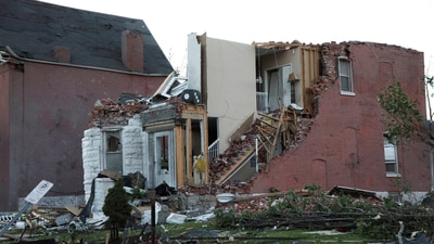 A view shows a side of a brick home ripped away, after a tornado hit St. Louis, Missouri. (REUTERS)