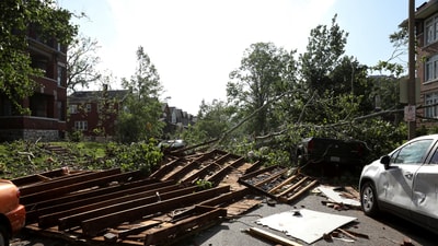 A roof from a home blocks a residential street after a powerful tornado ripped through the city, in St. Louis, Missouri, US. (REUTERS)