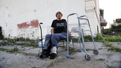 An elderly woman sits on a chair after a tornado forced residents outside of their homes in St. Louis, Missouri,U.S. May 16, 2025. REUTERS/Lawrence Bryant (REUTERS)