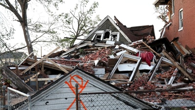A house lies completely collapsed under a mountain of bricks, after a tornado struck in St. Louis, Missouri,U.S. May 16, 2025. REUTERS/Lawrence Bryant (REUTERS)