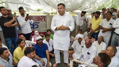 Water minister Parvesh Verma interacts with farmers at Daulatpur village in New Delhi on Saturday. (PTI) Water minister Parvesh Verma interacts with farmers at Daulatpur village in New Delhi on Saturday. (PTI)