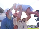 Scottie Scheffler, left, is greeted by his wife Meredith, center, and their son Bennett after winning the CJ Cup Byron Nelson Scottie Scheffler, left, is greeted by his wife Meredith, center, and their son Bennett after winning the CJ Cup Byron Nelson