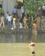 The water in the canal was shallow. But it was probably due to thick silt that Ankit could not move out. (Sakib Ali/HT Photo) The water in the canal was shallow. But it was probably due to thick silt that Ankit could not move out. (Sakib Ali/HT Photo)