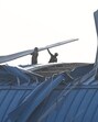 Workers assess the damage and fix the roof at the New Ashok Nagar RRTS station. (Sanjeev Verma/HT Photo) Workers assess the damage and fix the roof at the New Ashok Nagar RRTS station. (Sanjeev Verma/HT Photo)
