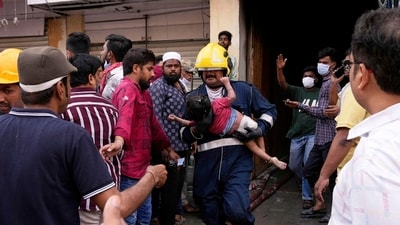 At least 17 people died after fire broke out early Sunday morning at a building housing the Krishna Pearls shop and a residential complex near Charminar in Hyderabad. (AP) At least 17 people died after fire broke out early Sunday morning at a building housing the Krishna Pearls shop and a residential complex near Charminar in Hyderabad. (AP)