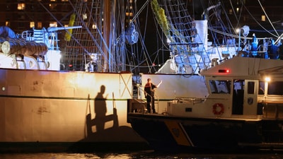 A New York Police Department harbor unit prepares to board the Cuauhtémoc, a masted Mexican Navy training ship that collided with the Brooklyn Bridge, Saturday, May 17, 2025, in New York. (AP Photo/Yuki Iwamura) (AP)