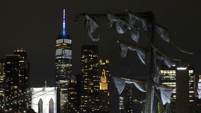 The New York skyline and Brooklyn Bridge are framed in one of the snapped masts of a Mexican Navy training ship after it collided with the Brooklyn Bridge, Saturday, May 17, 2025, in New York. (AP Photo/Yuki Iwamura) (AP)