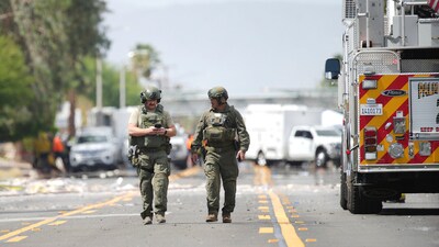 Sheriffs deputies walk near the scene of an explosion Saturday, May 17, 2025, in Palm Springs, Calif. (AP Photo/Eric Thayer) (AP) Sheriffs deputies walk near the scene of an explosion Saturday, May 17, 2025, in Palm Springs, Calif. (AP Photo/Eric Thayer) (AP)