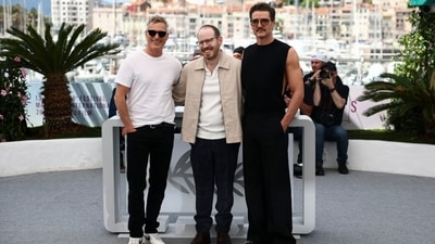 Director Ari Aster and cast members Pedro Pascal and Joaquin Phoenix pose during a photocall for the film "Eddington" in competition at the 78th Cannes Film Festival in Cannes, France, May 17, 2025. (REUTERS/Sarah Meyssonnier) Director Ari Aster and cast members Pedro Pascal and Joaquin Phoenix pose during a photocall for the film "Eddington" in competition at the 78th Cannes Film Festival in Cannes, France, May 17, 2025. (REUTERS/Sarah Meyssonnier)