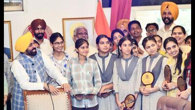 Chief minister Bhagwant Mann felicitating PSEB class 10 and 12 toppers in his official residence in Chandigarh. (HT Photo) Chief minister Bhagwant Mann felicitating PSEB class 10 and 12 toppers in his official residence in Chandigarh. (HT Photo)