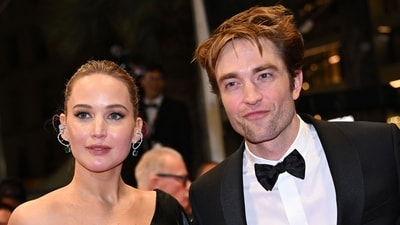 US actress Jennifer Lawrence and British actor Robert Pattinson leave after the screening of the film "Die, My Love" at the 78th edition of the Cannes Film Festival in Cannes, southern France, on May 17, 2025. (Photo by Bertrand GUAY / AFP) (AFP) US actress Jennifer Lawrence and British actor Robert Pattinson leave after the screening of the film "Die, My Love" at the 78th edition of the Cannes Film Festival in Cannes, southern France, on May 17, 2025. (Photo by Bertrand GUAY / AFP) (AFP)