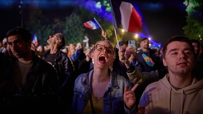 Fans of the singer representing France react as she performs, while watching at a fan zone on Place de la Bastille, a broadcast of the grand final of the Eurovision Song Contest 2025, which takes place in Basel, Switzerland, in Paris on May 17, 2025. (Photo by Kiran RIDLEY / AFP) (AFP) Fans of the singer representing France react as she performs, while watching at a fan zone on Place de la Bastille, a broadcast of the grand final of the Eurovision Song Contest 2025, which takes place in Basel, Switzerland, in Paris on May 17, 2025. (Photo by Kiran RIDLEY / AFP) (AFP)