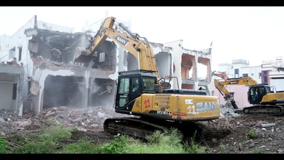 On Saturday, PCMC demolished 36 unauthorised bungalows—part of the ‘River Villa’ project—constructed within the blue flood line, a protected area where no development is permitted. (HT FILE) On Saturday, PCMC demolished 36 unauthorised bungalows—part of the ‘River Villa’ project—constructed within the blue flood line, a protected area where no development is permitted. (HT FILE)