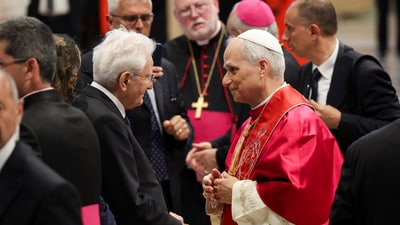 Pope Leo XIV greets Italy's President Sergio Mattarella in St. Peter’s Basilica following his inaugural Mass at the Vatica. REUTERS/Claudia Greco/Pool (REUTERS)