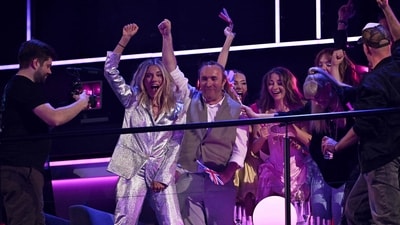 British group Remember Monday representing the United Kingdom with the song "What The Hell Just Happened?" reacts to the results announcement during the grand final of the Eurovision Song Contest 2025, at the St. Jakobshalle arena in Basel on May 18, 2025. (Photo by Fabrice COFFRINI / AFP) (AFP) British group Remember Monday representing the United Kingdom with the song "What The Hell Just Happened?" reacts to the results announcement during the grand final of the Eurovision Song Contest 2025, at the St. Jakobshalle arena in Basel on May 18, 2025. (Photo by Fabrice COFFRINI / AFP) (AFP)