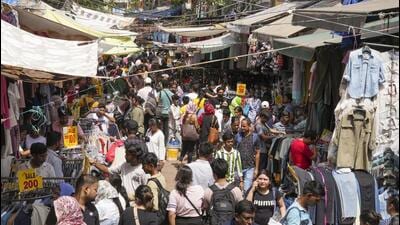 Shopkeepers use makeshift tarpaulin sheets to protect from heat, on Sunday, after more permanent structures were removed in an anti-encroachment drive. (PTI) Shopkeepers use makeshift tarpaulin sheets to protect from heat, on Sunday, after more permanent structures were removed in an anti-encroachment drive. (PTI)