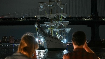 A Mexican Navy training ship is seen near the Manhattan Bridge after it slammed into the nearby Brooklyn Bridge in New York on May 17, 2025. (Photo by ANGELA WEISS / AFP) (AFP)