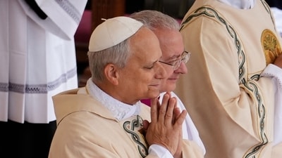 Pope Leo XIV leads the Mass marking the official start of his pontificate in St. Peter’s Square. (Photo by Jacquelyn Martin / POOL / AFP) (AFP) Pope Leo XIV leads the Mass marking the official start of his pontificate in St. Peter’s Square. (Photo by Jacquelyn Martin / POOL / AFP) (AFP)