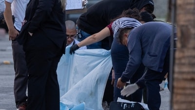 Investigators look at possible evidence near the American Reproductive Centers fertility clinic following a bomb blast on May 17, 2025 in Palm Springs, California. (Getty Images via AFP) Investigators look at possible evidence near the American Reproductive Centers fertility clinic following a bomb blast on May 17, 2025 in Palm Springs, California. (Getty Images via AFP)