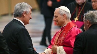 Pope Leo XIV speaks with Italy's Foreign Minister Antonio Tajani after the Holy Mass marking the beginning of his pontificate in St. Peter’s Basilica. (Photo by Alberto PIZZOLI / AFP) (AFP) Pope Leo XIV speaks with Italy's Foreign Minister Antonio Tajani after the Holy Mass marking the beginning of his pontificate in St. Peter’s Basilica. (Photo by Alberto PIZZOLI / AFP) (AFP)