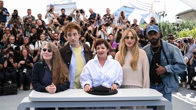 The cast of the film, Sissy Spacek, Robert Pattinson, Jennifer Lawrence and Lakeith Stanfield pose during a photocall for Die, My Love with director Lynne Ramsay. (Photo by Bertrand GUAY / AFP) (AFP)