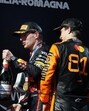 Red Bull's Max Verstappen celebrates after winning the Emilia Romagna GP with second placed McLaren's Lando Norris and third placed McLaren's Oscar Piastri. (REUTERS)