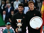 Spain's Carlos Alcaraz (l) and Italy's Jannik Sinner (r) pose for pictures at the end of their men's singles final match for the ATP Rome Open tennis tournament at Foro Italico in Rome on May 18 Spain's Carlos Alcaraz (l) and Italy's Jannik Sinner (r) pose for pictures at the end of their men's singles final match for the ATP Rome Open tennis tournament at Foro Italico in Rome on May 18