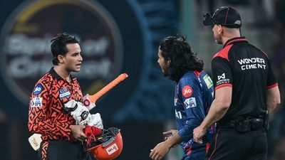 Sunrisers Hyderabad's Abhishek Sharma (L) reacts after his dismissal by Lucknow Super Giants' Digvesh Rathi (C). (AFP)