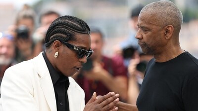 US actor and singer Asap Rocky and US actor Denzel Washington pose during a photocall for the film "Highest 2 Lowest" at the 78th edition of the Cannes Film Festival in Cannes, southern France, on May 19, 2025. (Photo by Sameer AL-DOUMY / AFP) (AFP) US actor and singer Asap Rocky and US actor Denzel Washington pose during a photocall for the film "Highest 2 Lowest" at the 78th edition of the Cannes Film Festival in Cannes, southern France, on May 19, 2025. (Photo by Sameer AL-DOUMY / AFP) (AFP)