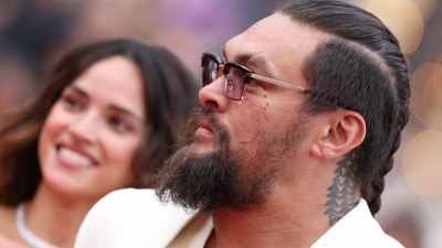 US actor Jason Momoa and US actress Adria Arjona arrive for the screening of the film "Splitsville" at the 78th edition of the Cannes Film Festival in Cannes, southern France, on May 19, 2025. (Photo by Sameer AL-DOUMY / AFP) (AFP) US actor Jason Momoa and US actress Adria Arjona arrive for the screening of the film "Splitsville" at the 78th edition of the Cannes Film Festival in Cannes, southern France, on May 19, 2025. (Photo by Sameer AL-DOUMY / AFP) (AFP)