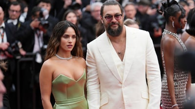 Adria Arjona, left, and Jason Momoa pose for photographers upon arrival at the premiere of the film 'Highest 2 Lowest' at the 78th international film festival, Cannes, southern France, Monday, May 19, 2025. (Photo by Lewis Joly/Invision/AP) (Lewis Joly/Invision/AP) Adria Arjona, left, and Jason Momoa pose for photographers upon arrival at the premiere of the film 'Highest 2 Lowest' at the 78th international film festival, Cannes, southern France, Monday, May 19, 2025. (Photo by Lewis Joly/Invision/AP) (Lewis Joly/Invision/AP)