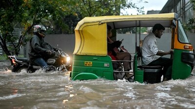 Bengaluru rain created havoc on Monday morning across the city. (AFP) Bengaluru rain created havoc on Monday morning across the city. (AFP)
