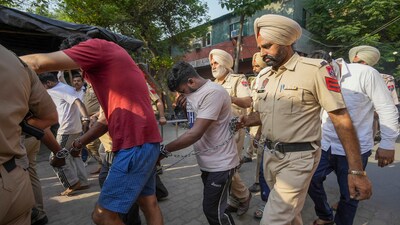 The accused were caught with mobile phones and live cartridges. A case has been filed under the Official Secrets Act, and further investigation is underway. (Representative image) (PTI) The accused were caught with mobile phones and live cartridges. A case has been filed under the Official Secrets Act, and further investigation is underway. (Representative image) (PTI)