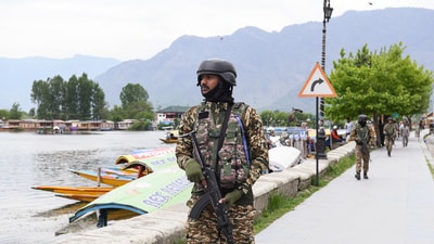 CRPF personnel patrol on the banks of Dal lake after the Pahalgam terror attack. (ANI Photo) CRPF personnel patrol on the banks of Dal lake after the Pahalgam terror attack. (ANI Photo)