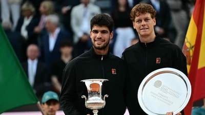 Spain's Carlos Alcaraz (l) and Italy's Jannik Sinner (r) pose for pictures at the end of their men's singles final match for the ATP Rome Open tennis tournament at Foro Italico in Rome on May 18 (AFP) Spain's Carlos Alcaraz (l) and Italy's Jannik Sinner (r) pose for pictures at the end of their men's singles final match for the ATP Rome Open tennis tournament at Foro Italico in Rome on May 18 (AFP)