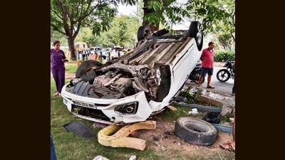 Victim’s car flipped multiple times before hitting roadside berm near Sector 26 in Panchkula. The driver of other car fled the scene. (HT) Victim’s car flipped multiple times before hitting roadside berm near Sector 26 in Panchkula. The driver of other car fled the scene. (HT)