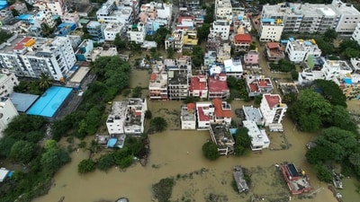 An aerial view shows a flooded locality following heavy rainfall in Bengaluru on May 19, 2025. (AFP) An aerial view shows a flooded locality following heavy rainfall in Bengaluru on May 19, 2025. (AFP)