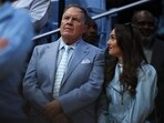 CHAPEL HILL, NORTH CAROLINA - MARCH 08: North Carolina Tar Heels football head coach Bill Belichick and his girlfriend Jordon Hudson look on during the first half of the game between the North Carolina Tar Heels and the Duke Blue Devils at Dean E. Smith Center on March 08, 2025 in Chapel Hill, North Carolina.   Jared C. Tilton/Getty Images/AFP (Photo by Jared C. Tilton / GETTY IMAGES NORTH AMERICA / Getty Images via AFP)
